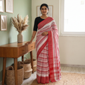 White Handloom Cotton Phulia Jamdani Saree, draped and worn by a woman, AI visual of the saree, iTokri