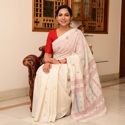 White Handloom Cotton Phulia Jamdani Saree, draped and worn by a woman, AI visual of the saree, iTokri