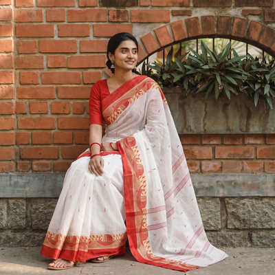 White Handloom Cotton Phulia Jamdani Saree, draped and worn by a woman, AI visual of the saree, iTokri