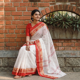 White Handloom Cotton Phulia Jamdani Saree, draped and worn by a woman, AI visual of the saree, iTokri