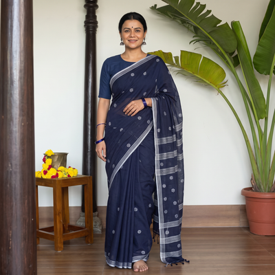 Blue Handloom Cotton Phulia Jamdani Saree with Tassels, draped and worn by a woman, AI visual of the saree, iTokri