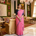 Pink Handloom Cotton Phulia Jamdani Saree with Tassels, draped and worn by a woman, AI visual of the saree, iTokri