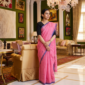 Pink Handloom Cotton Phulia Jamdani Saree with Tassels, draped and worn by a woman, AI visual of the saree, iTokri