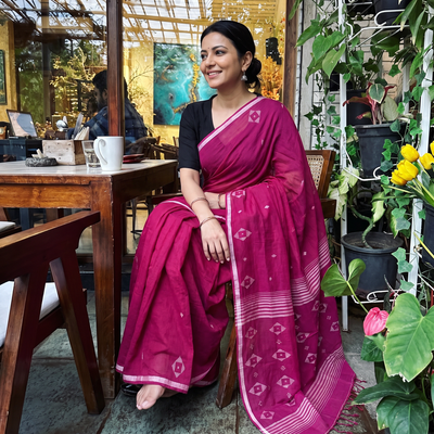 Purple Handloom Cotton Phulia Jamdani Saree with Tassels, draped and worn by a woman, AI visual of the saree, iTokri