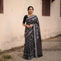 Grey Handloom Cotton Sambalpuri Ikat Saree, draped and worn by a woman, AI visual of the saree, iTokri