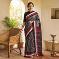 Grey Handloom Cotton Sambalpuri Ikat Saree, draped and worn by a woman, AI visual of the saree, iTokri