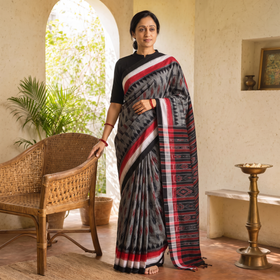 Grey Handloom Cotton Sambalpuri Ikat Saree, draped and worn by a woman, AI visual of the saree, iTokri
