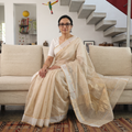 Beige Handloom Cotton Tissue Zari Buti Chanderi Saree, draped and worn by a woman, AI visual of the saree, iTokri