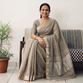 Brown Handloom Cotton Zari Border Mangalagiri Saree, draped and worn by a woman, AI visual of the saree, iTokri