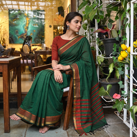 Green Handloom Cotton Zari Border Mangalagiri Saree, draped and worn by a woman, AI visual of the saree, iTokri
