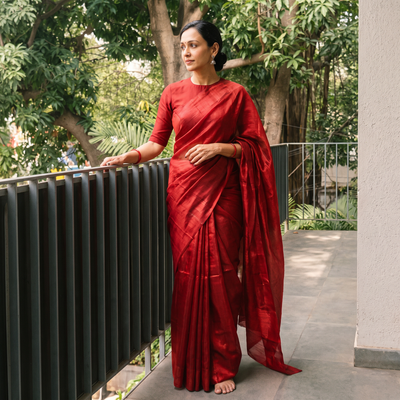 Red Handloom Full Tissue Zari Chanderi Silk Saree, draped and worn by a woman, AI visual of the saree, iTokri