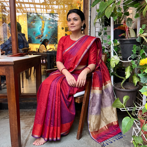 Orange Handloom Kosa Pallu Maheshwari Silk Saree, draped and worn by a woman, AI visual of the saree, iTokri