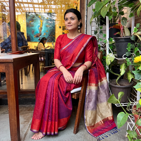 Orange Handloom Kosa Pallu Maheshwari Silk Saree, draped and worn by a woman, AI visual of the saree, iTokri