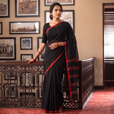 Black Handloom Mul Cotton Phulia Jamdani Saree, draped and worn by a woman, AI visual of the saree, iTokri