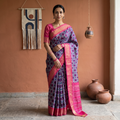 Purple Handloom Mulberry Silk Patola Ikat Pochampally Saree, draped and worn by a woman, AI visual of the saree, iTokri