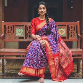Purple Handloom Mulberry Silk Patola Ikat Pochampally Saree, draped and worn by a woman, AI visual of the saree, iTokri