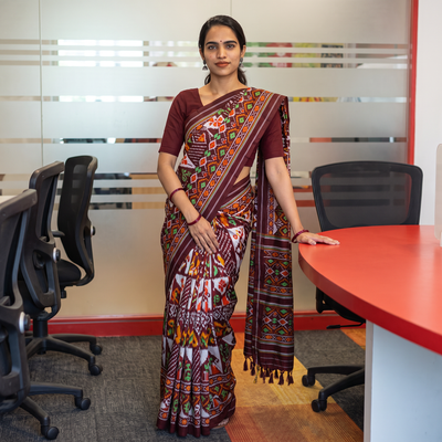Maroon Handloom Mulberry Silk Patola Ikat Pochampally Saree, draped and worn by a woman, AI visual of the saree, iTokri