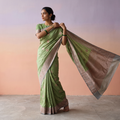 Green Handloom Pure Katan Silk Kaduwa Zari Buti Banarasi Saree, draped and worn by a woman, AI visual of the saree, iTokri
