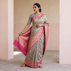 Beige Handloom Pure Katan Silk Kaduwa Zari Buti Banarasi Saree, draped and worn by a woman, AI visual of the saree, iTokri