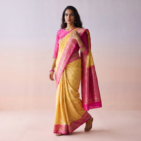 Yellow Handloom Pure Katan Silk Kaduwa Zari Buti Banarasi Saree, draped and worn by a woman, AI visual of the saree, iTokri