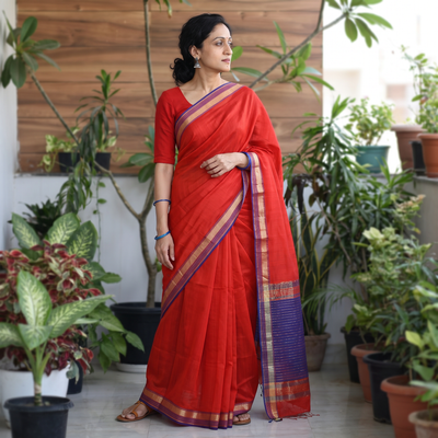 Red Handloom Silk Cotton Maheshwari Saree with Zari Border, draped and worn by a woman, AI visual of the saree, iTokri