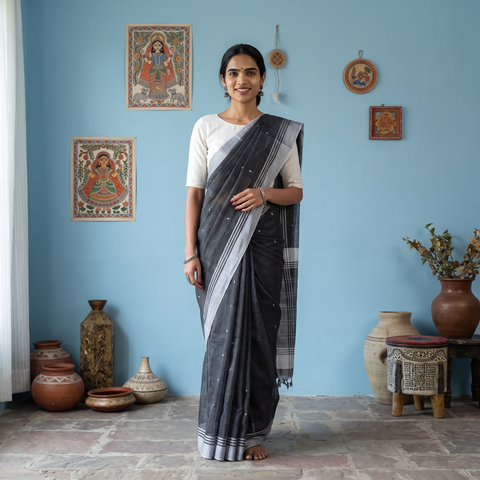 Black Handloom Thread Buti Chanderi Cotton Saree, draped and worn by a woman, AI visual of the saree, iTokri