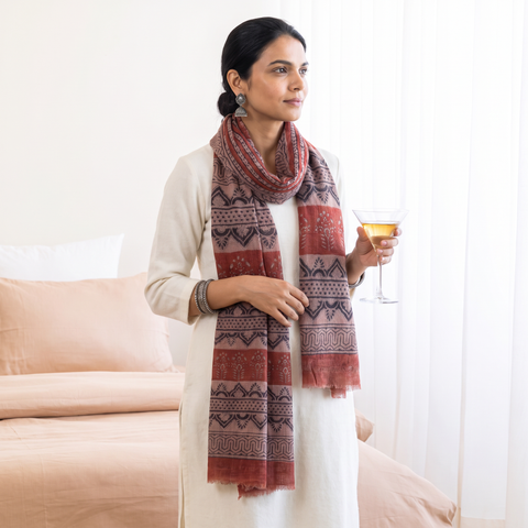 Red Handloom Woolen Natural Dyed Block Print Bagru Stole, worn by a woman, AI visual of the stole, iTokri