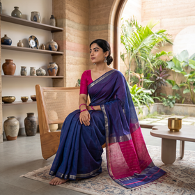 Blue Handloom Zari Border Maheshwari Silk Saree, draped and worn by a woman, AI visual of the saree, iTokri