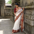 White Handloom Zari Work Chanderi Katan Silk Saree, draped and worn by a woman, AI visual of the saree, iTokri