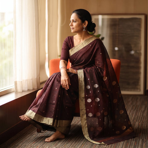 Maroon Handloom Zari Work Chanderi Silk Saree, draped and worn by a woman, AI visual of the saree, iTokri