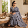 Grey Handloom Zari Work Chanderi Silk Saree, draped and worn by a woman, AI visual of the saree, iTokri