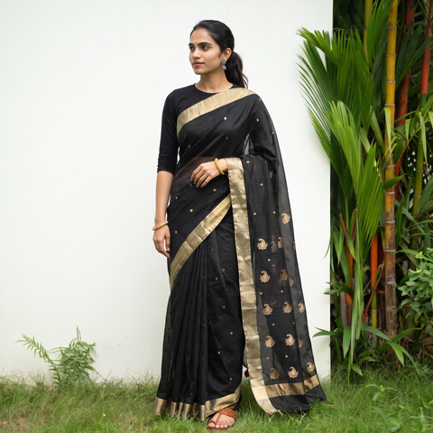 Black Handloom Zari Work Chanderi Silk Saree, draped and worn by a woman, AI visual of the saree, iTokri