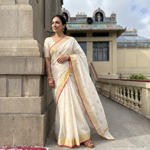 White Handloom Zari Work Chanderi Silk Saree, draped and worn by a woman, AI visual of the saree, iTokri