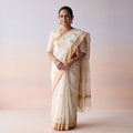 White Handloom Zari Work Chanderi Silk Saree, draped and worn by a woman, AI visual of the saree, iTokri