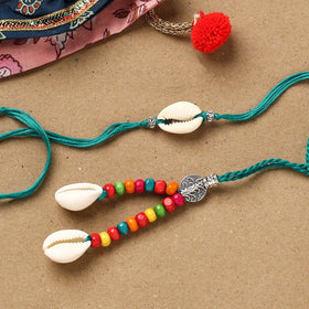 Handmade beads shell work rakhi & lumba set 134