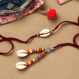Handmade beads shell work rakhi & lumba set 135