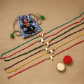 Handmade jute fabart shell work rakhi (set of 6) 155