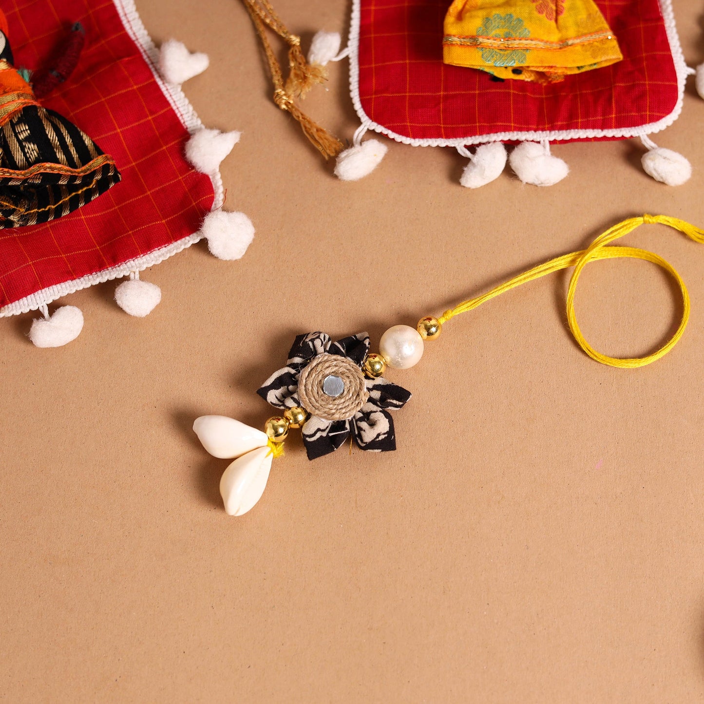 Buy Handmade Fabric Flower Jute Rakhi & Lumba Set 