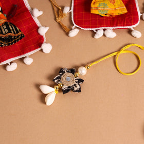 Buy Handmade Fabric Flower Jute Rakhi & Lumba Set 