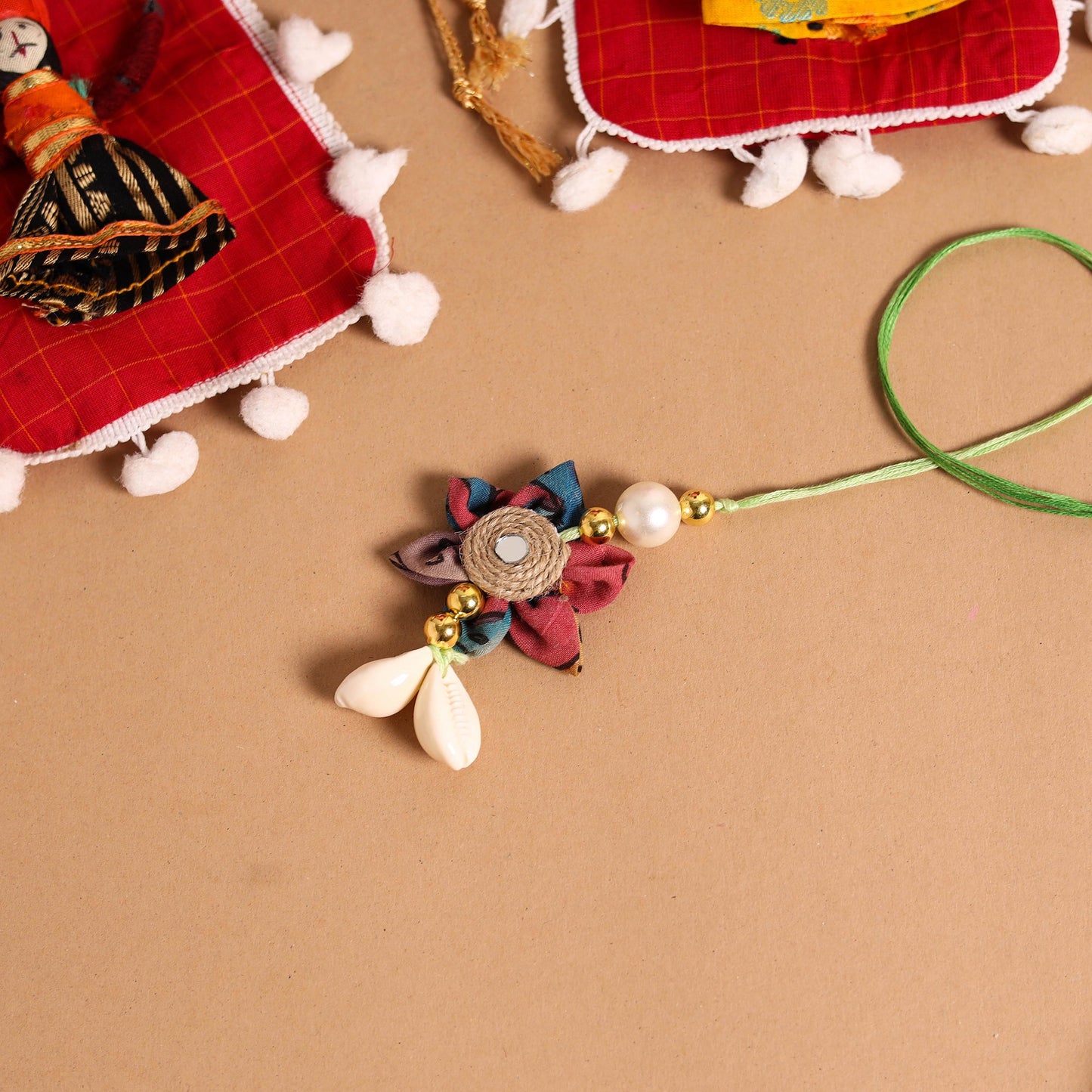 Buy Handmade Fabric Flower Jute Rakhi & Lumba Set 