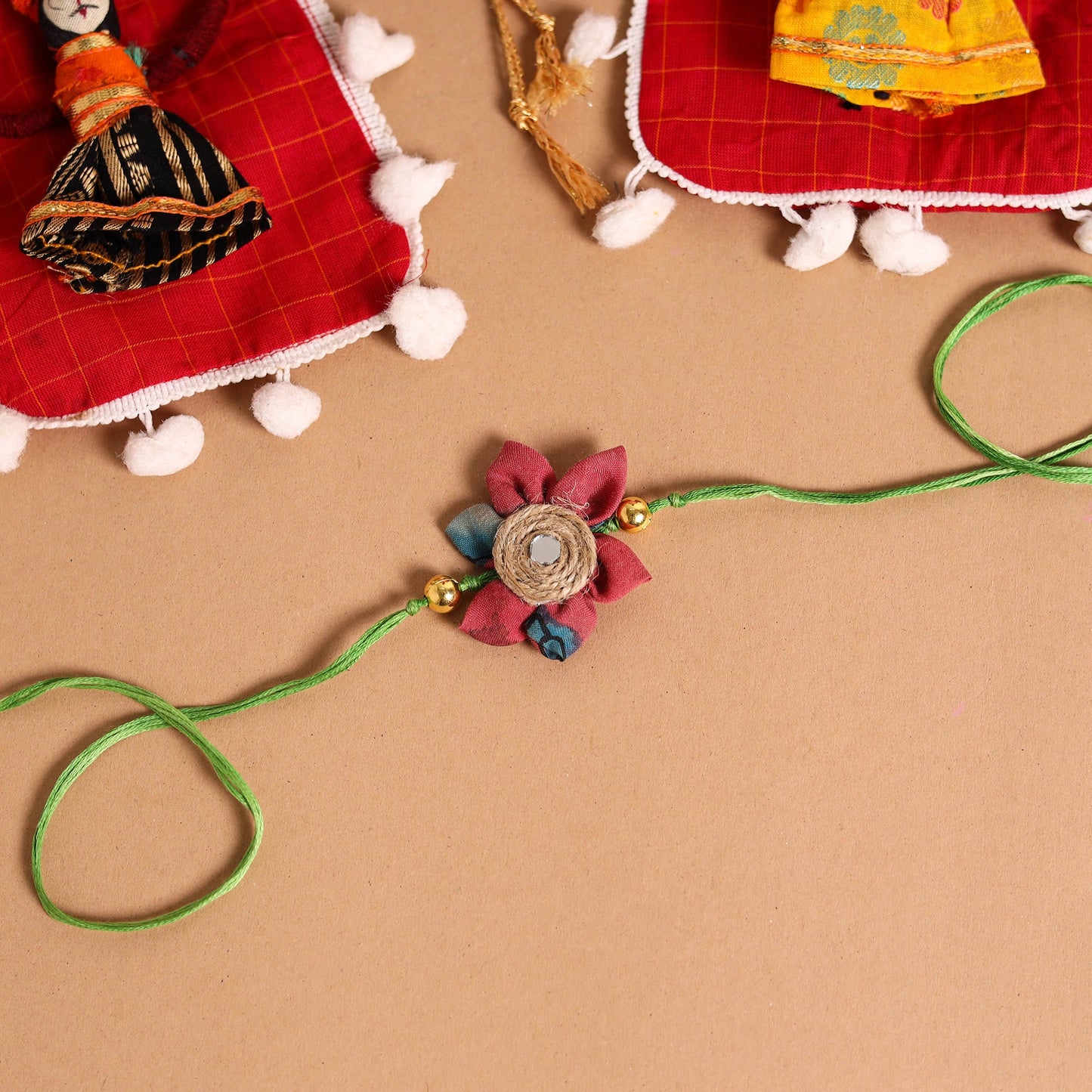 Buy Handmade Fabric Flower Jute Rakhi & Lumba Set 