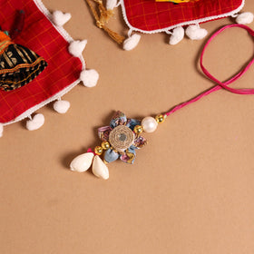 Buy Handmade Fabric Flower Jute Rakhi & Lumba Set 