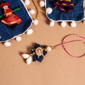 Buy Handmade Fabric Flower Jute Rakhi & Lumba Set 