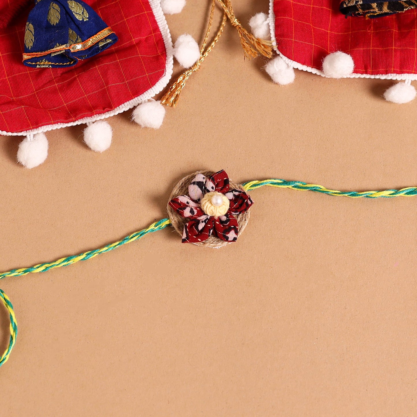  Handmade Fabric Flower Jute Rakhi (Set of 2)