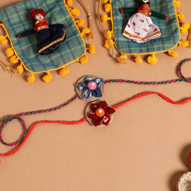  Handmade Fabric Flower Jute Rakhi (Set of 2)