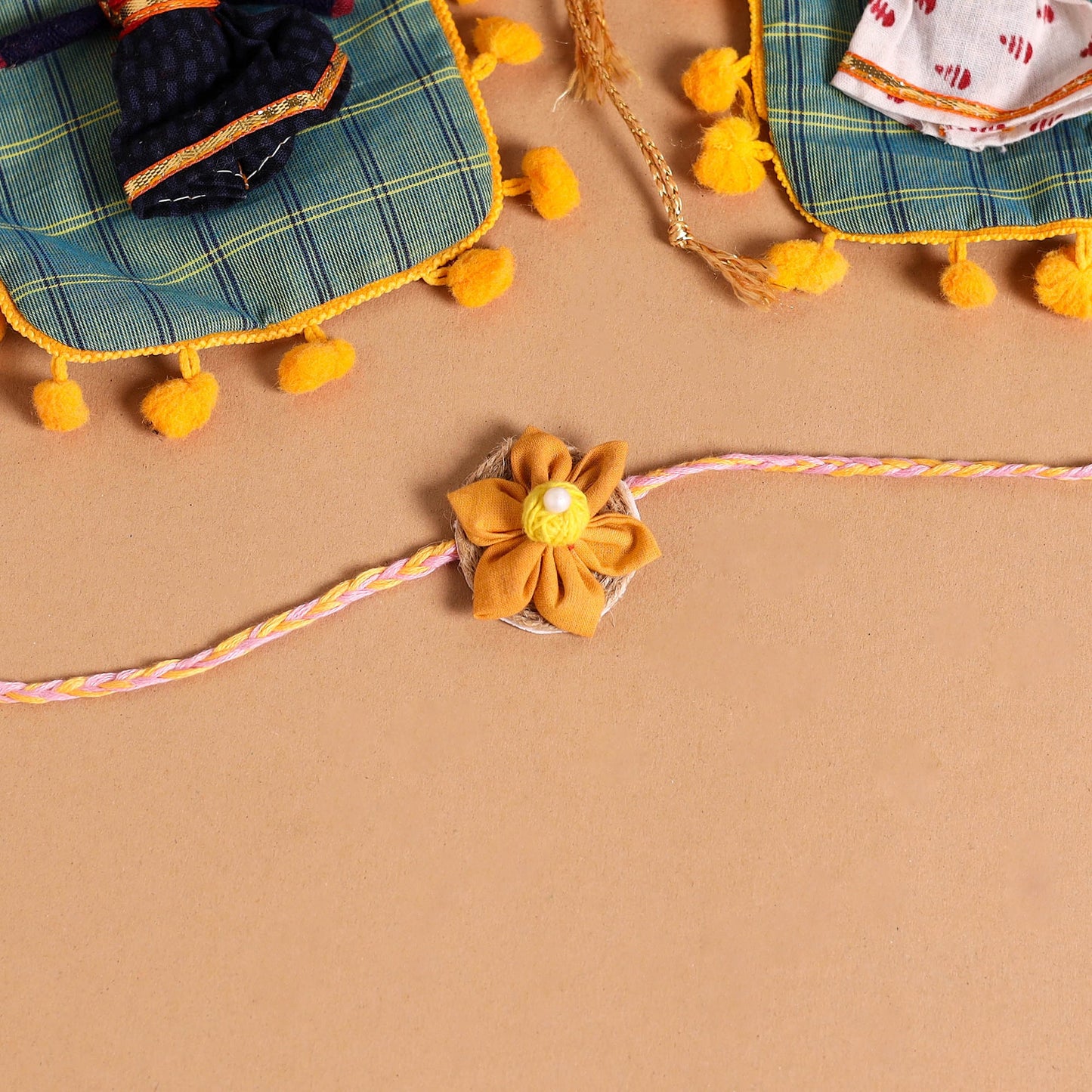  Handmade Fabric Flower Jute Rakhi (Set of 2)
