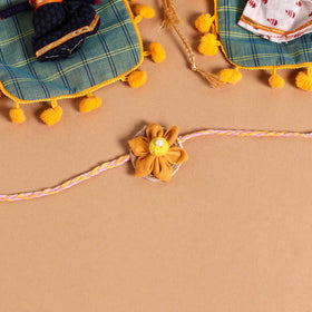  Handmade Fabric Flower Jute Rakhi (Set of 2)
