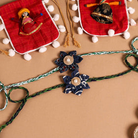  Handmade Fabric Flower Jute Rakhi (Set of 2)