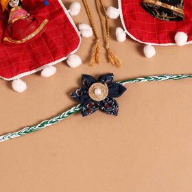  Handmade Fabric Flower Jute Rakhi (Set of 2)