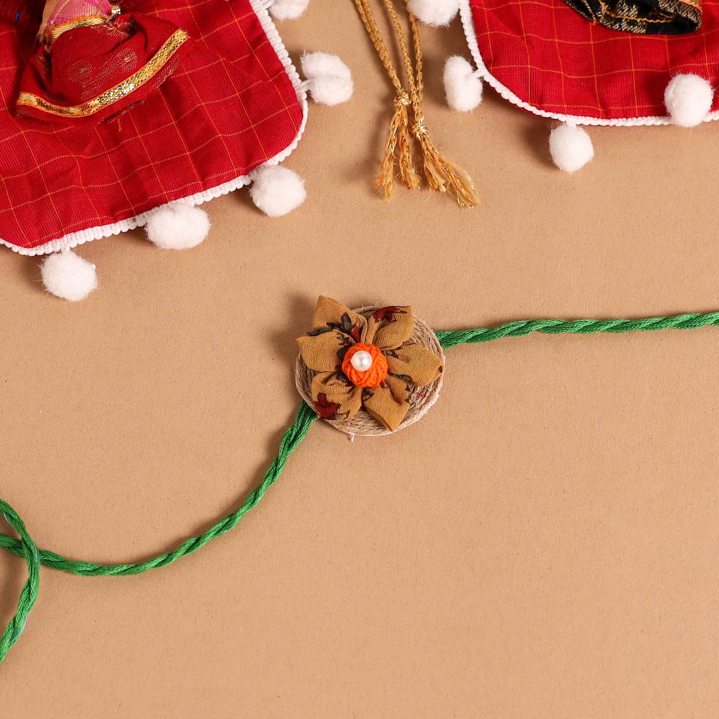  Handmade Fabric Flower Jute Rakhi (Set of 2)